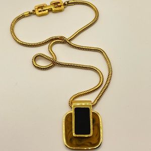 Vintage 1977 Givenchy Paris New York Gold Tone necklace .